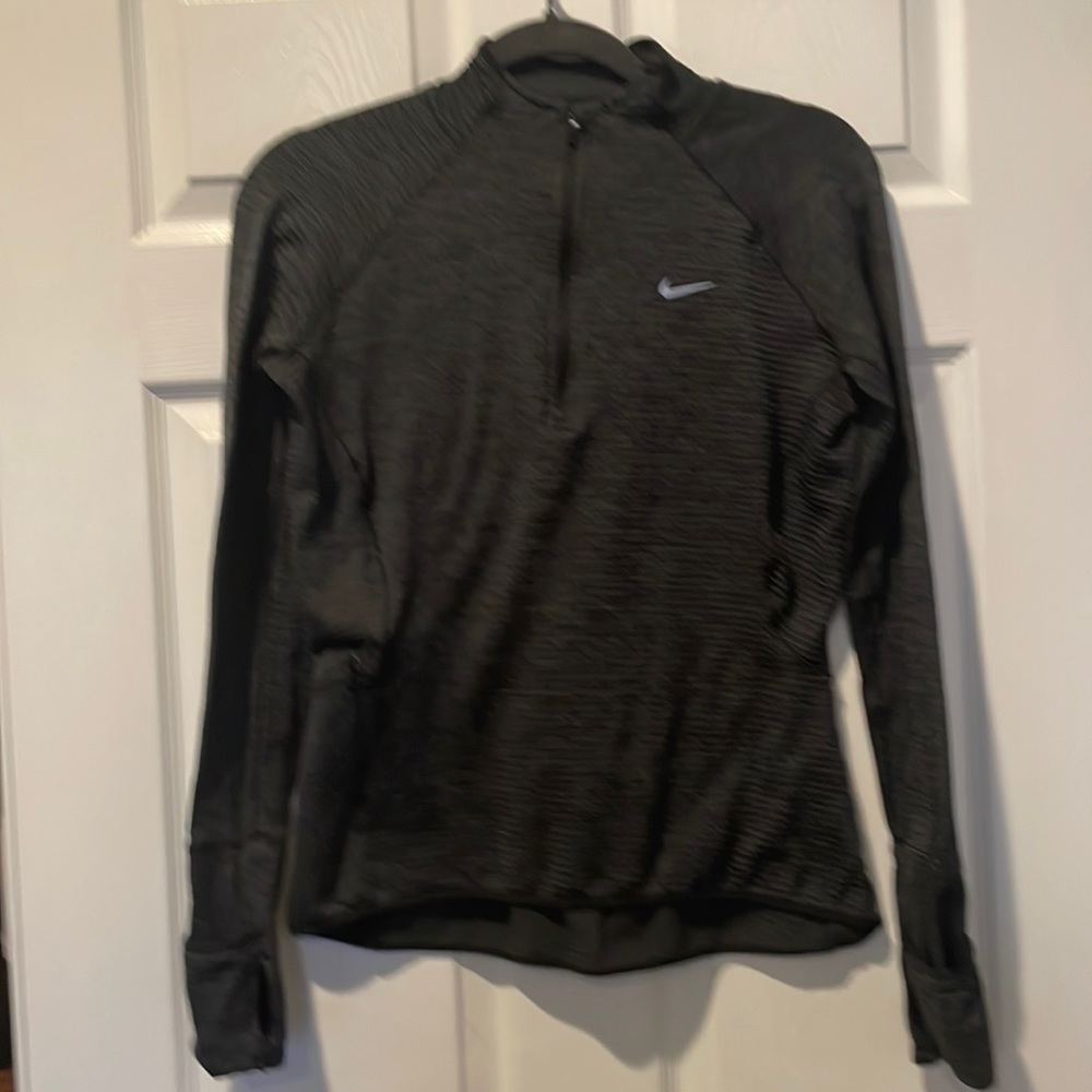 Nike Women’s Dri-Fit 1/4 zip pullover.